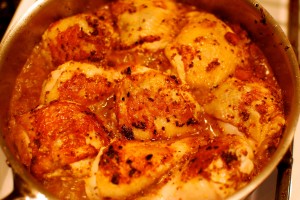Chicken simmering in the frypan. 